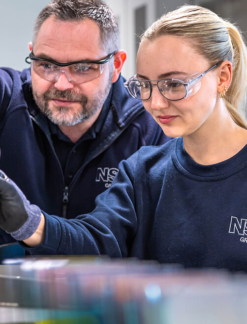 Two researchers working in a lab